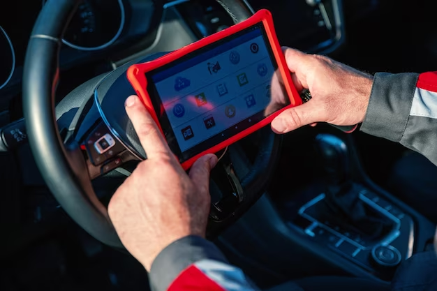 A digital car battery tester showing the battery's cold cranking amps and voltage readings