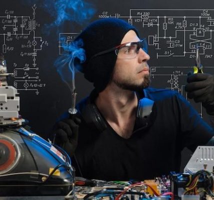 Electrical engineering student studying hard for exams