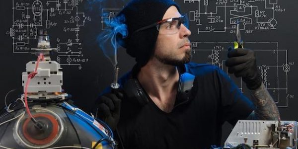 Electrical engineering student studying hard for exams