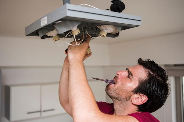 Step-by-step guide on wiring a ceiling fan with light to two switches